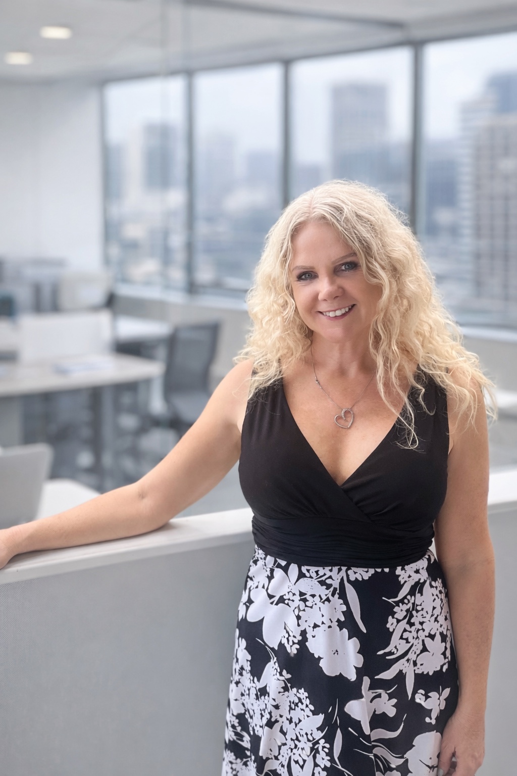 Lorna Angell, Founder of Angell Advisory, in a Sydney office overlooking the city